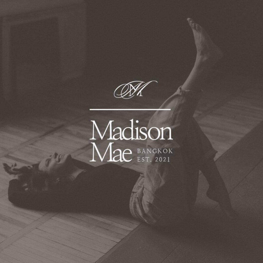 primary-logo-madison-mae-logo-on-image-woman-lying-floor